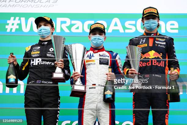 Race winner David Beckmann of Germany and Trident, second placed Oscar Piastri of Australia and Prema Racing and third placed Dennis Hauger of Norway...
