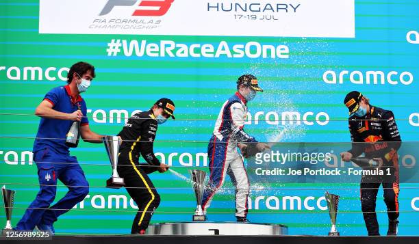 Race winner David Beckmann of Germany and Trident, second placed Oscar Piastri of Australia and Prema Racing and third placed Dennis Hauger of Norway...
