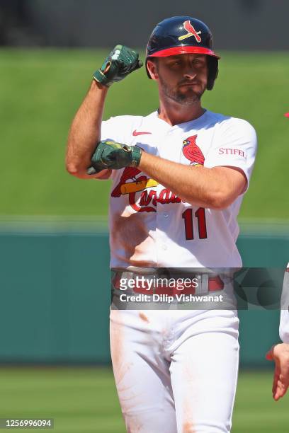 Paul DeJong of the St. Louis Cardinals celebrates after hitting an RBI single against the Los Angeles Dodgers in the fifth inning at Busch Stadium on...