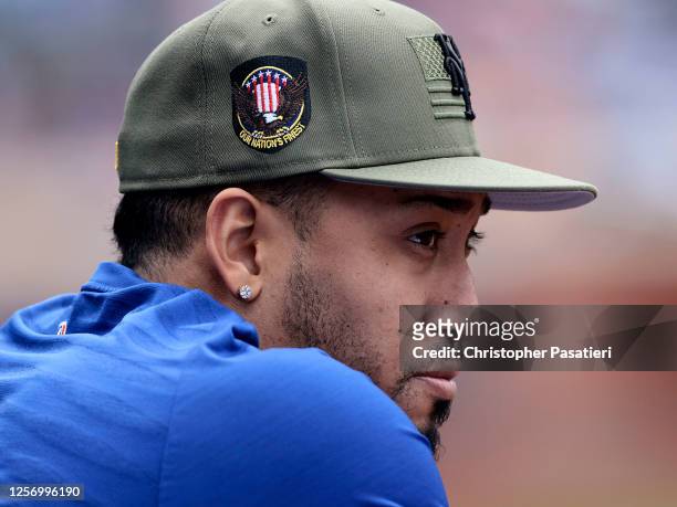 Edwin Diaz of the New York Mets looks on from the dugout during game one of a double header against the Cleveland Guardians at Citi Field on May 21,...