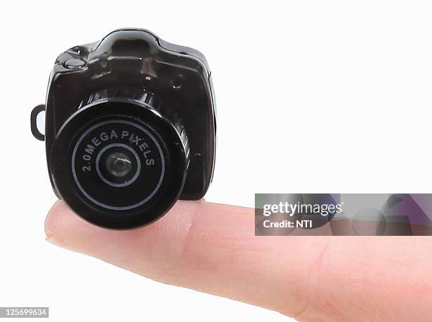 The world's smallest digital camera, measuring just over one inch in all dimensions and weighing only half an ounce, is pictured on May 17, 2011 in...