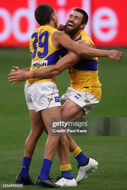 Jarrod Cameron and Josh J. Kennedy of the Eagles celebrate a goal during the round 7 AFL match between the Fremantle Dockers and the West Coast...
