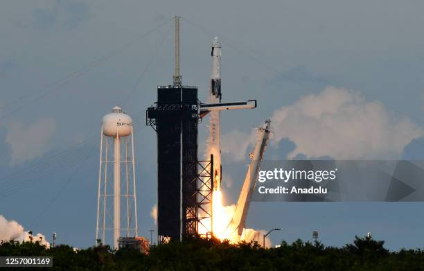 SpaceX Falcon 9 rocket with the Crew Dragon spacecraft lifts off from pad 39A at the Kennedy Space Center for the Axiom Mission 2 on May 21, 2023 in...