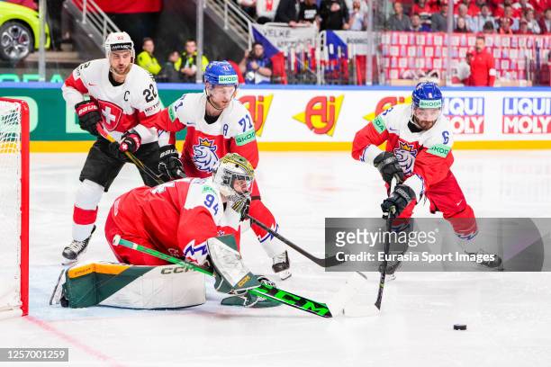 Michal Kempny of Czech Republic helps goalkeeper Marek Langhamer of Czech Republic during the 2023 IIHF Ice Hockey World Championship Finland -...