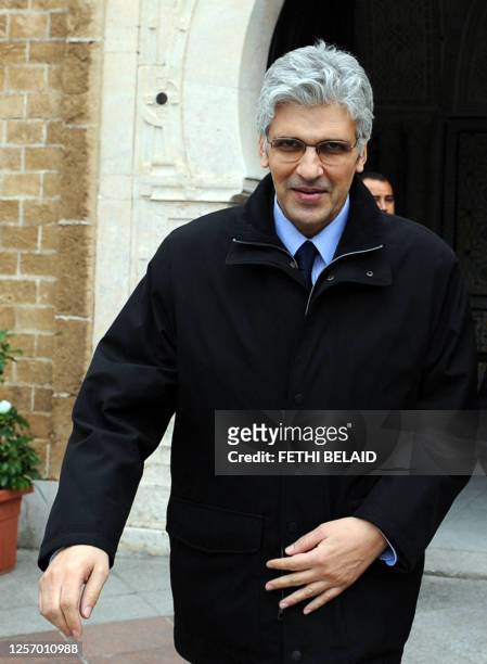 Tunisian Development and International Cooperation Minister Mohamed Nouri Jouini arrives on January 20, 2011 at the Government Palace in Tunis to...