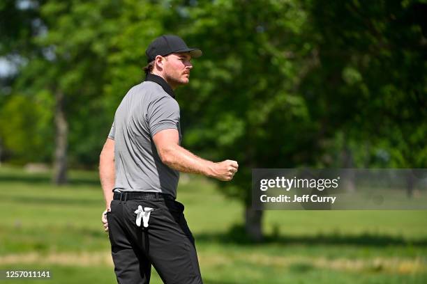 Grayson Murray reacts after making an eagle putt on the 13th hole during the final round of the AdventHealth Championship at Blue Hills Country Club...