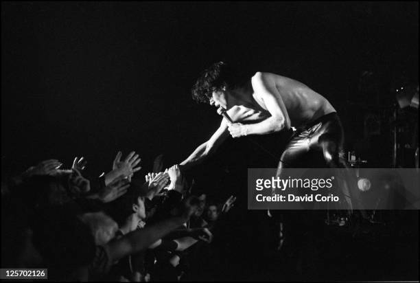 Lux Interior of The Cramps performing at Leeds, UK, 26th September 1981.