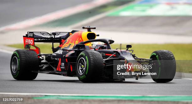 Max Verstappen of the Netherlands driving the Aston Martin Red Bull Racing RB16 crashes on the way to the grid before the Formula One Grand Prix of...