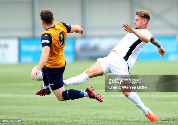Ben Harris of Slough Town and Jack Jebb of Dartford FC fight for the ball during the Vanarama National League South Play-Off match between Slough...