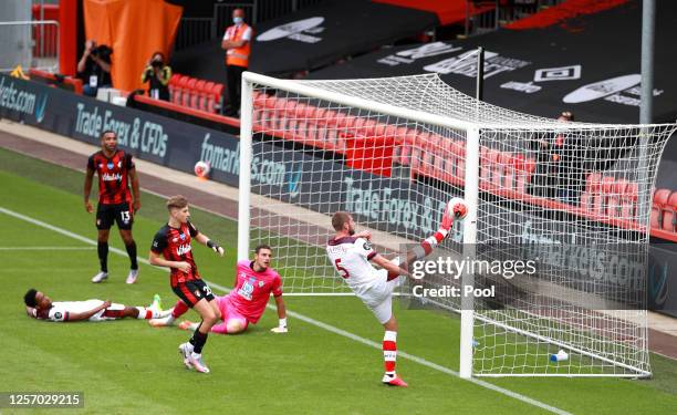 Jack Stephens of Southampton clears the ball off the line during the Premier League match between AFC Bournemouth and Southampton FC at Vitality...