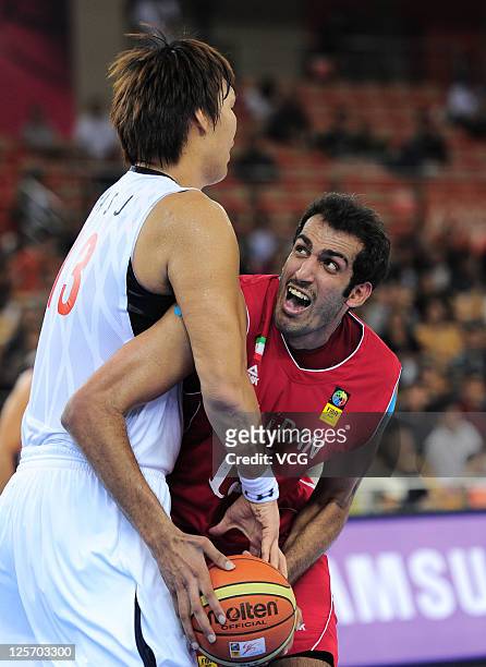 Hamed Hadadi of Iran in action in the match between Iran and South Korea during the FIBA Asia Championship at Wuhan Sports Center on September 21,...