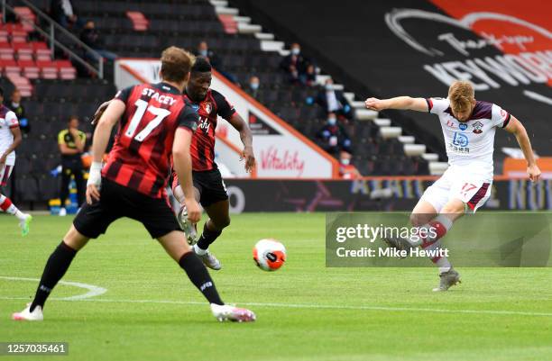 Stuart Armstrong of Southampton shoots during the Premier League match between AFC Bournemouth and Southampton FC at Vitality Stadium on July 19,...