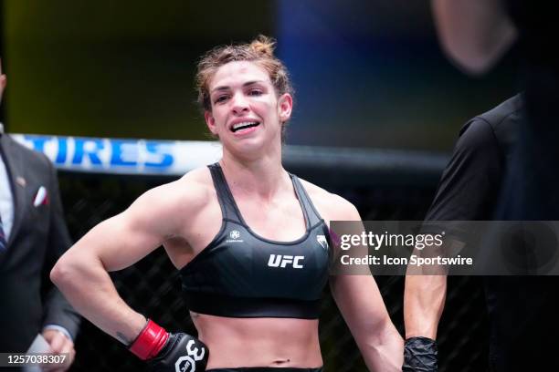 Mackenzie Dern battles Angela Hill in their Women's Strawweight bout during the UFC Vegas 73 event at UFC Apex on May 20 in Las Vegas, NV.