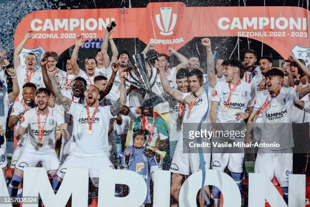 The players from Farul Constanta team celebrates winning the title in as they lift the trophy during the Round 9 of Liga 1 Romania Play-off match...