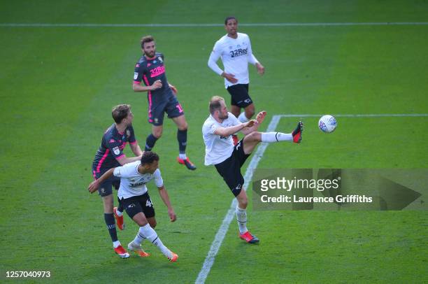 Matthew Clarke of Derby County scores an own goal which leads to Leeds United third goal of the game during the Sky Bet Championship match between...