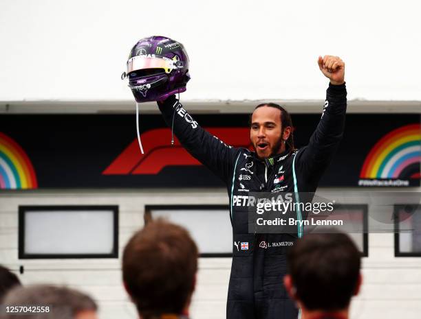 Race winner Lewis Hamilton of Great Britain and Mercedes GP celebrates in parc ferme after the Formula One Grand Prix of Hungary at Hungaroring on...