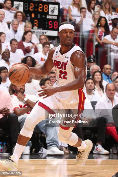 Jimmy Butler of the Miami Heat dribbles the ball during Round 3 Game 3 of the Eastern Conference Finals 2023 NBA Playoffs against the Boston Celtics...