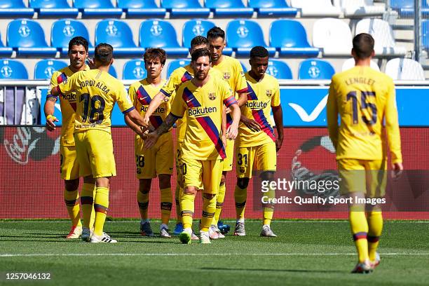 Players of FC Barcelona celebrating their team's first goal during the Liga match between Deportivo Alaves and FC Barcelona at Estadio de...