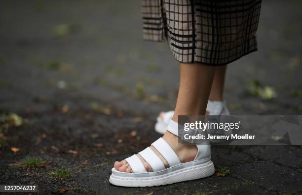 Lea Neumann wearing Weekday dress, Dr Martens sandals on July 15, 2020 in Berlin, Germany.