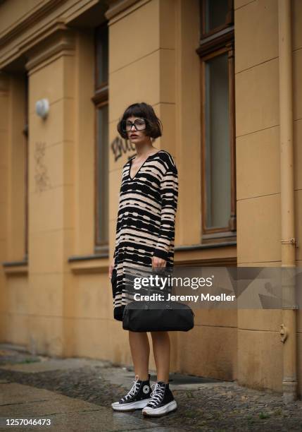 Lea Neumann wearing Fendi Baguette bag, Converse chucks, Missoni dress and vintage glasses on July 15, 2020 in Berlin, Germany.