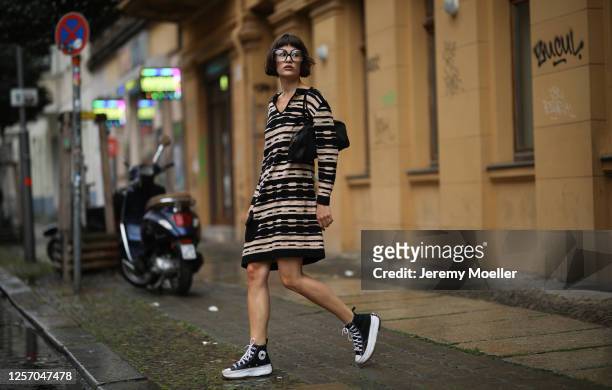 Lea Neumann wearing Fendi Baguette bag, Converse chucks, Missoni dress and vintage glasses on July 15, 2020 in Berlin, Germany.
