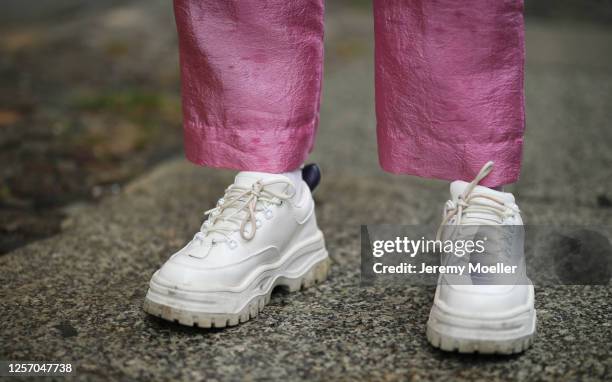 Lea Neumann wearing Stine Goya pants and Eytys sneaker on July 15, 2020 in Berlin, Germany.