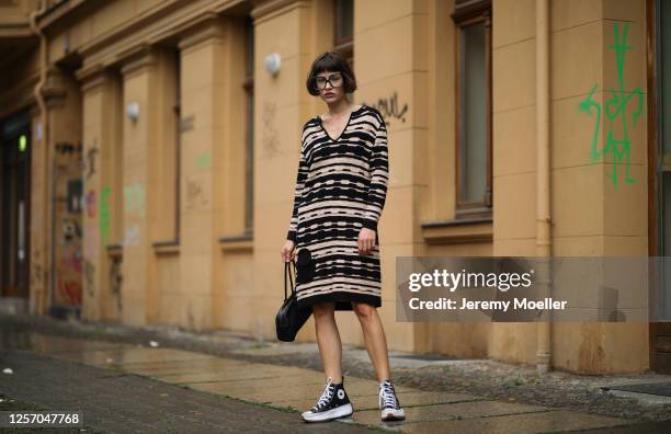 Lea Neumann wearing Fendi Baguette bag, Converse chucks, Missoni dress and vintage glasses on July 15, 2020 in Berlin, Germany.