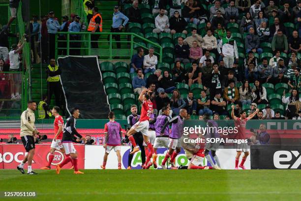 Benfica players celebrate their second goal during the Portuguese Liga Bwin football match between Sporting CP and SL Benfica at Estadio Jose...