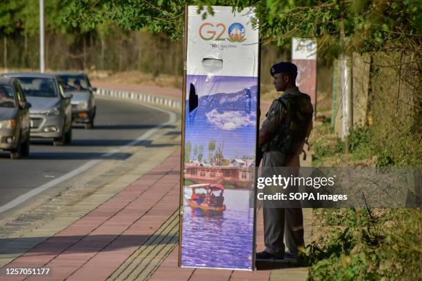 Paramilitary trooper stands alert near the smart bunker ahead of the G20 Tourism meeting in Srinagar. Security has been beefed up across the Kashmir...