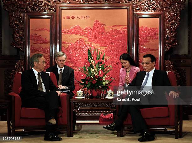 Secretary of energy Steven Chu , meets with Chinese Vice Premier Li Keqiang as he visits the Zhongnanhai on September 21, 2011 in Beijing, China.