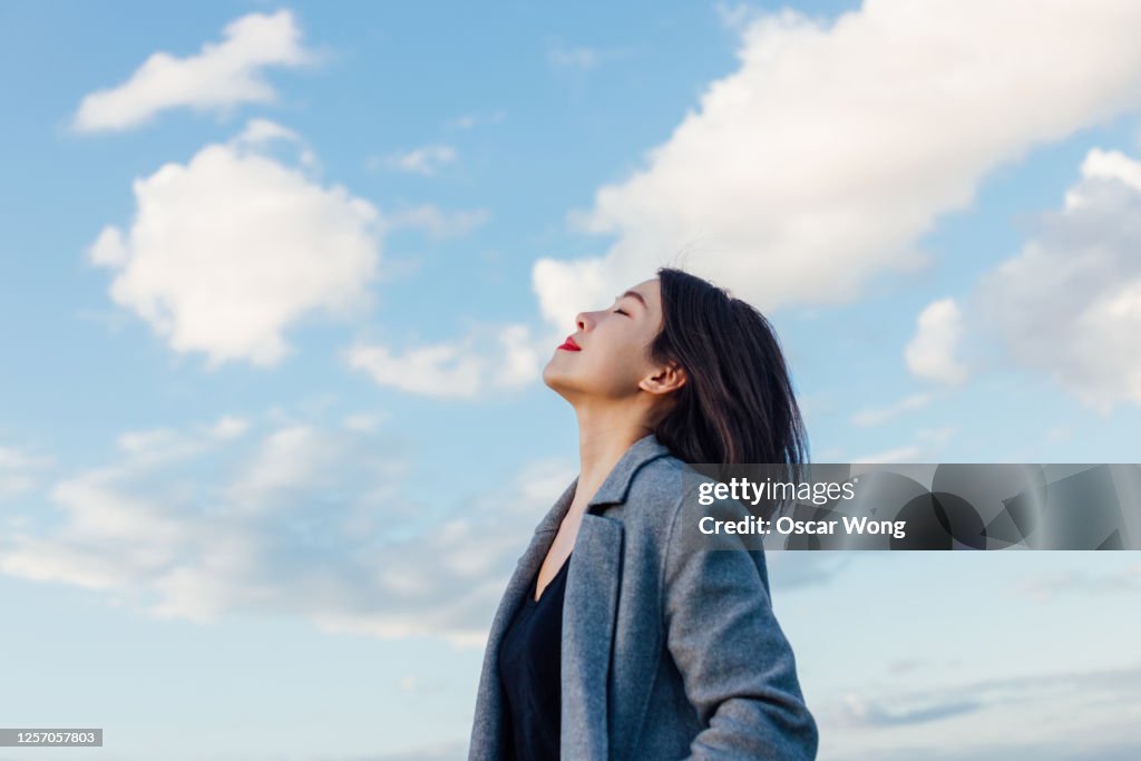 Young Lady Embracing Hope And Freedom