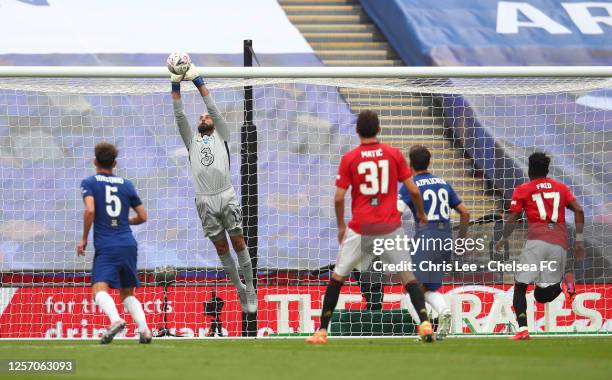 Willy Caballero of Chelsea makes a save during the FA Cup Semi Final match between Manchester United and Chelsea at Wembley Stadium on July 19, 2020...