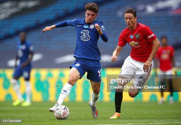 Mason Mount of Chelsea battles for possession with Nemanja Matic of Manchester United during the FA Cup Semi Final match between Manchester United...