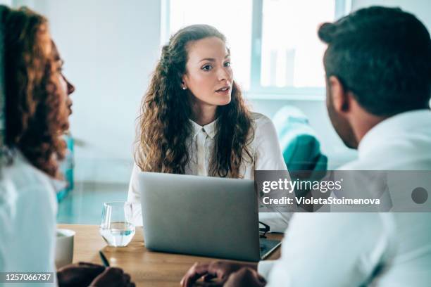 family therapist on a  meeting with young couple. - infertility doctor stock pictures, royalty-free photos & images