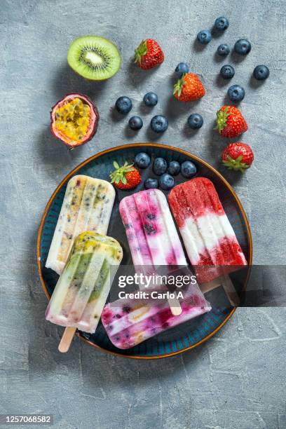 mixed fruit and yoghurt popsicles - ice lolly stock pictures, royalty-free photos & images