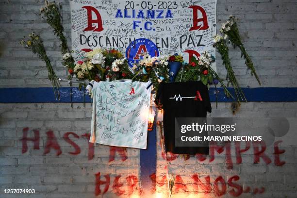 Makeshift memorial for victims of a stampede is pictured outside Cuscatlan stadium in San Salvador on May 21, 2023. El Salvador was in shock on May...