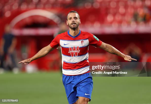 Roberto Soldado of Granada celebrates after he scores his sides first goal during the Liga match between Granada CF and Athletic Club at Nuevo Los...