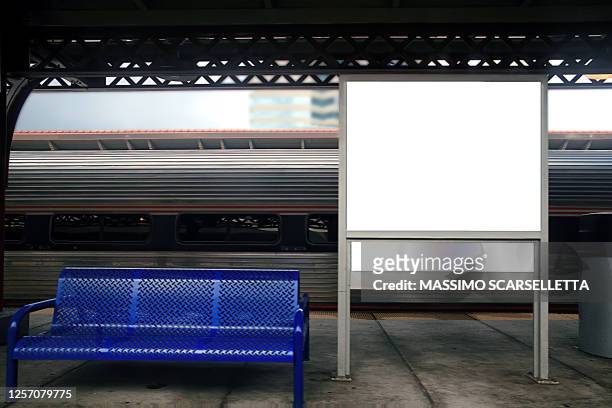 blank and white billboard at one train station in united states of america. - us blank billboard stockfoto's en -beelden
