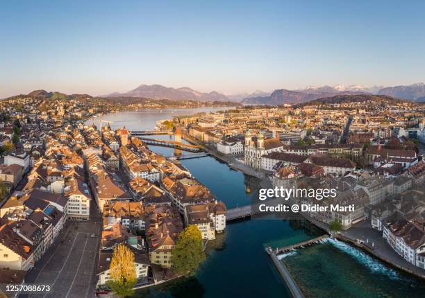 aerial view of the lucerne old town along the reuss river in central switzerland - lucerne stock pictures, royalty-free photos & images