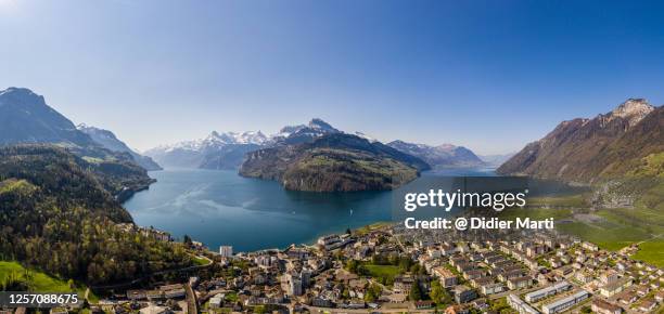 dramatic panorama of the lake lucerne and the brunnen town in switzerland - schwyz stock pictures, royalty-free photos & images