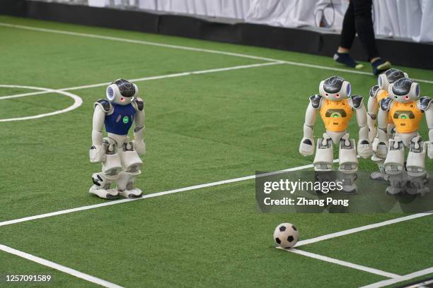 Robot football match is in progress on the 7th World Intelligence Congress, which is held from May 18 to May 21 in Tianjin, China. This football...