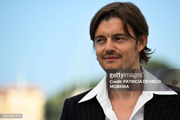 British actor Sam Riley poses during a photocall for the film "Firebrand" at the 76th edition of the Cannes Film Festival in Cannes, southern France,...