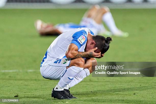 Players of CD Leganes react as they are relegated from La Liga after the Liga match between CD Leganes and Real Madrid CF at Estadio Municipal de...