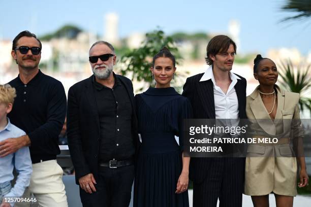 British actor Jude Law, Brazilian director Karim Ainouz, Swedish actress Alicia Vikander, British actor Sam Riley and actress Mina Andala pose during...