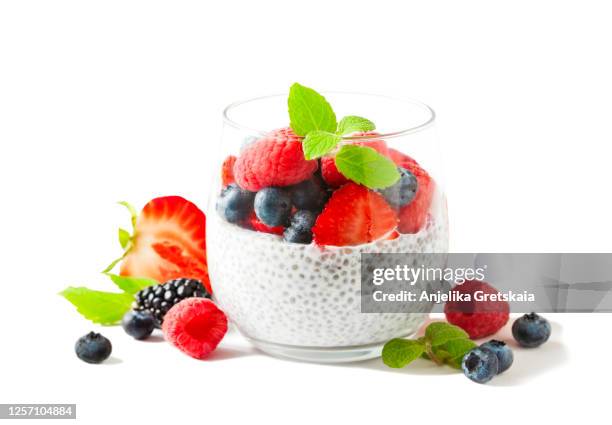 chia seed pudding with berries. - pudding stock pictures, royalty-free photos & images