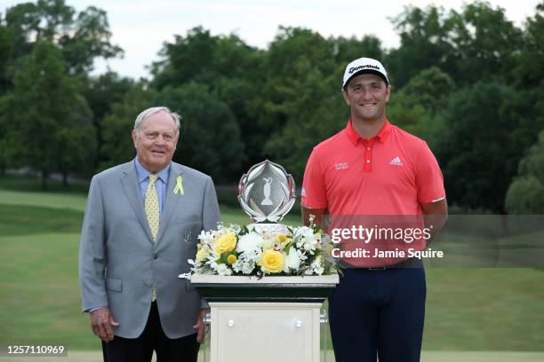 Jon Rahm of Spain celebrates with Jack Nicklaus and the trophy after winning in the final round of The Memorial Tournament on July 19, 2020 at...