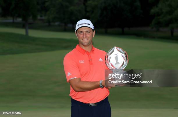 Jon Rahm of Spain celebrates with the trophy after winning during the final round of The Memorial Tournament on July 19, 2020 at Muirfield Village...