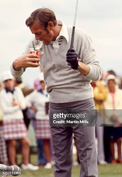 Golfer Bruce Devlin of Australia eats a snack out of his coke cup during the Jackie Gleason Inverrary-National Airlines Classic on February 22, 1973...