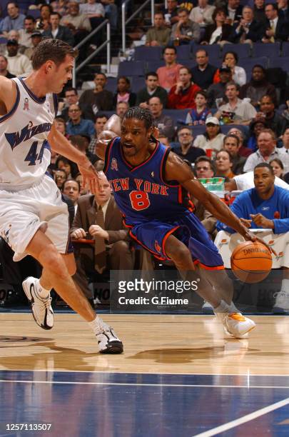 Latrell Sprewell of the New York Knicks handles the ball against the Washington Wizards at the MCI Center on December 13, 2001 in Washington, DC....