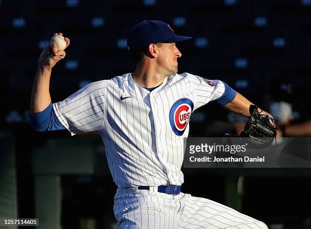 Starting pitcher Kyle Hendricks of the Chicago Cubs delivers the ball against the Chicago White Sox during an exhibition game at Wrigley Field on...